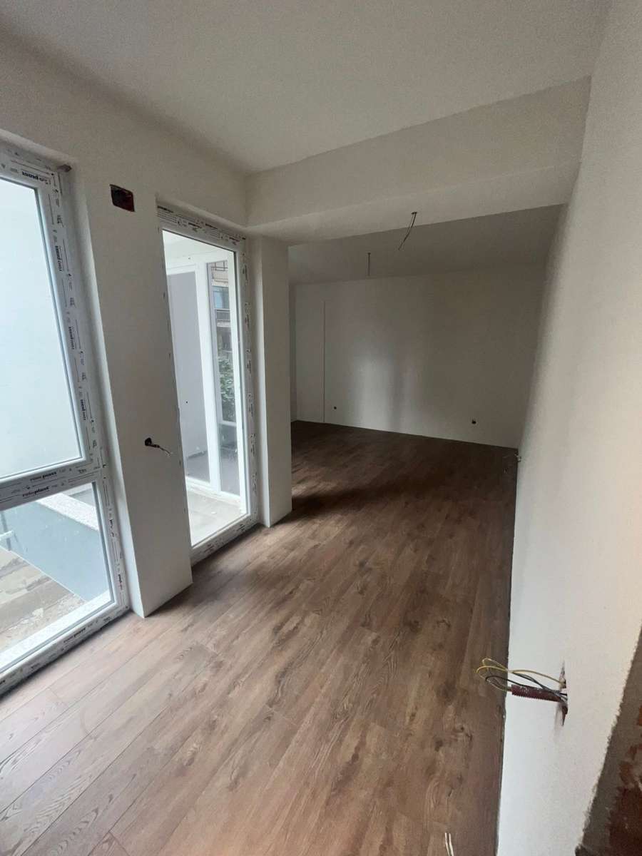 Гарсоњера во центар, со подземен паркинг - 1